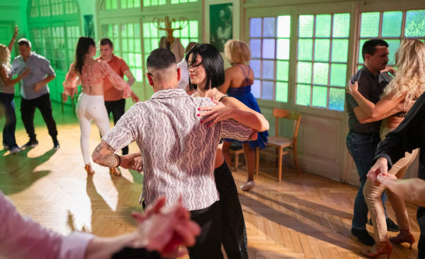 istock Professional Dance Couples Dancing In The Evening 2205893839