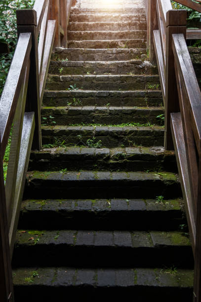 istock Staircase with wooden railing outdoors 2205894268