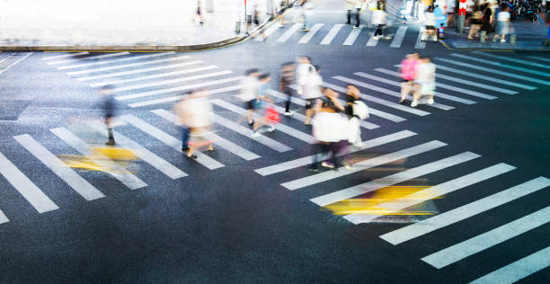 istock People are walking on the zebra crossing 2205894350