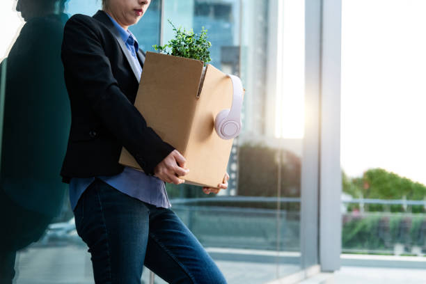 istock Unemployed man standing outside the office building 2205894507