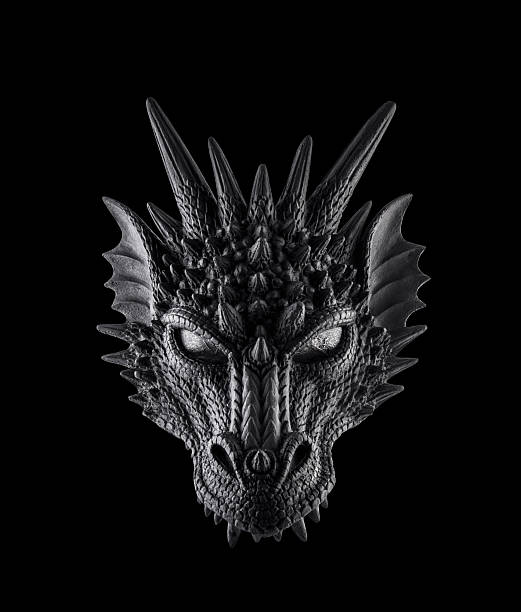 Black dragon head isolated on black background with clipping path