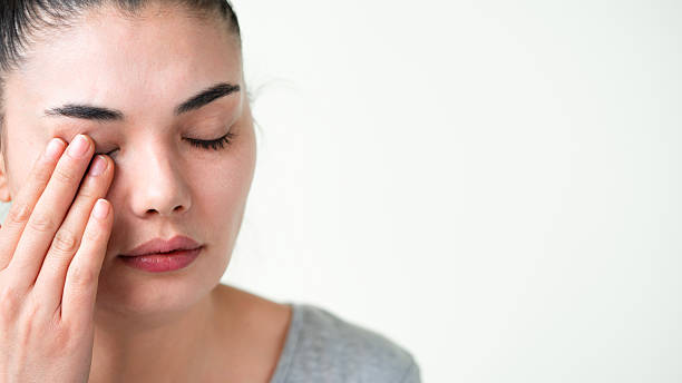 Young woman suffering from pain
