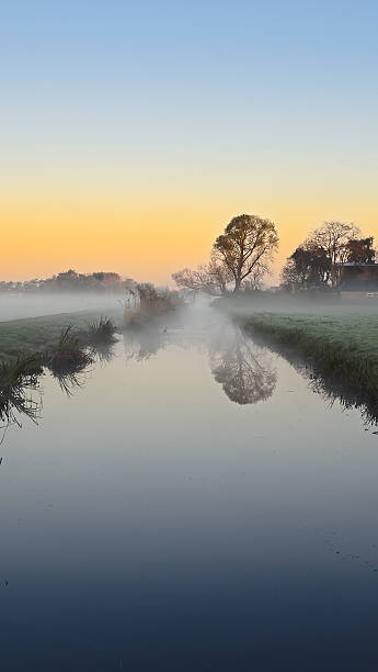 istock Fog and ditch at dawn in Ackerdijkse Plassen nature reserve 2205898536