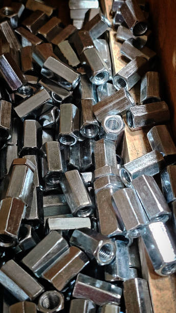 istock metal nuts of different diameters and thicknesses in a hardware store 2205903804