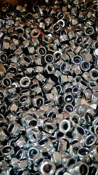 istock metal nuts of different diameters and thicknesses in a hardware store 2205903848