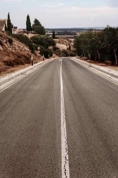 istock Empty Rural Road Leading into the Countryside 2205906138
