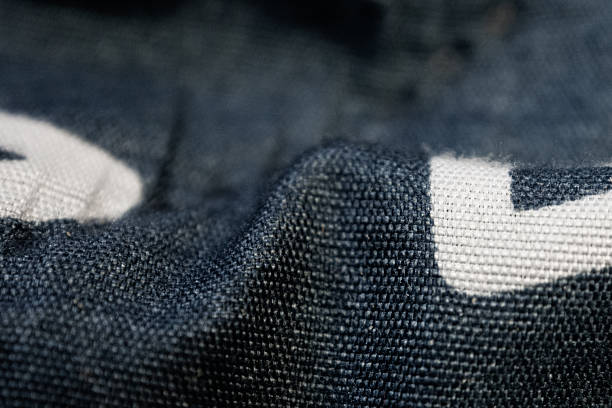 istock A fabric texture macro shot that highlights details and patterns, perfect for design projects and illustrations. 2205906497