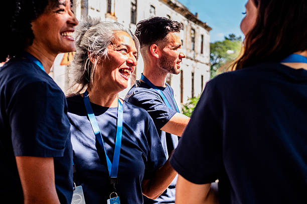 istock Volunteers talking outdoors 2205910068