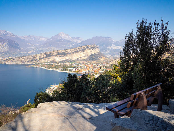 Empty Bench with a beautiful view of Lake Garda, Torbole, Italy.