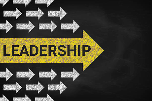 istock Leadership concept with arrows . Chalk on the blackboard. 2205912666
