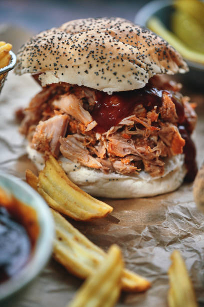 istock Pulled Pork Sliders with Pickles and Barbecue Sauce 2205917603