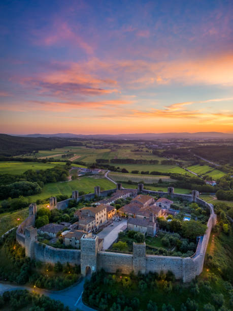 Monteriggioni, Italy - Sept 17, 2022: Piazza Roma in Monteriggioni medieval walled town. Tuscany, Italy