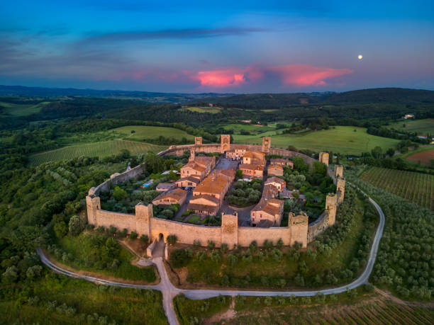 Monteriggioni, Italy - Sept 17, 2022: Piazza Roma in Monteriggioni medieval walled town. Tuscany, Italy