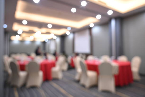 istock Abstract blurred photo of conference hall 2205924549