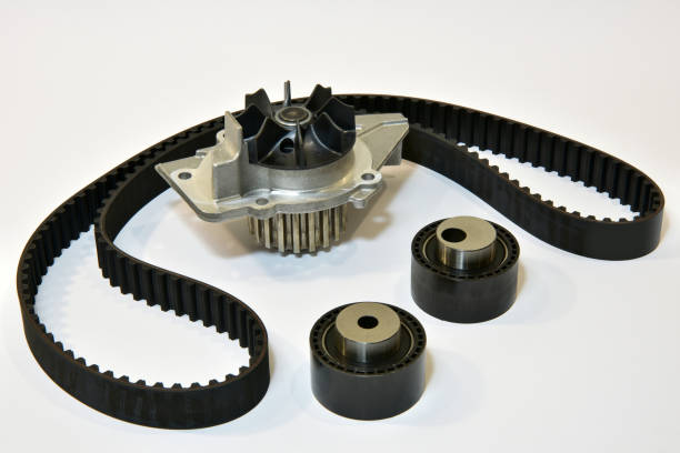 istock The timing belt, rollers and water pump stands on a white background 2205931754