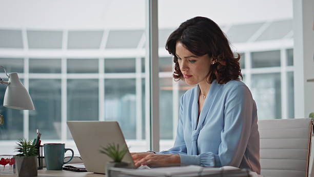 istock Busy businesswoman reading document at modern office feeling tired closeup. 2205935653