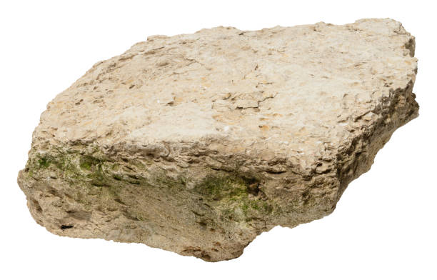 istock Rough natural stone with uneven surface and moss, isolated background. Ideal for construction, landscaping 2205936655