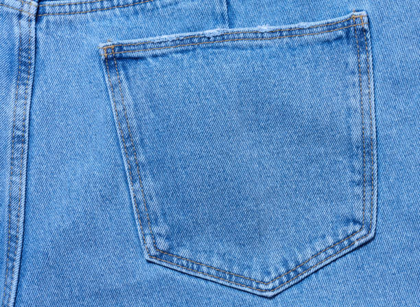 istock Back pocket of blue jeans, close up 2205936741