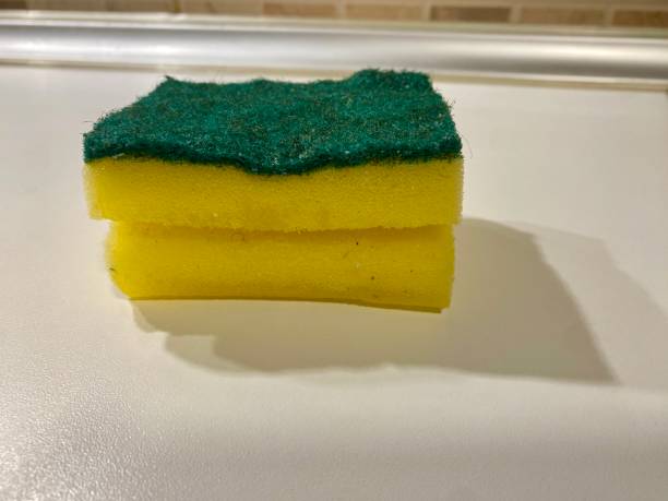 istock Contaminated and used dishwashing liquid and dish sponge. 2205942262