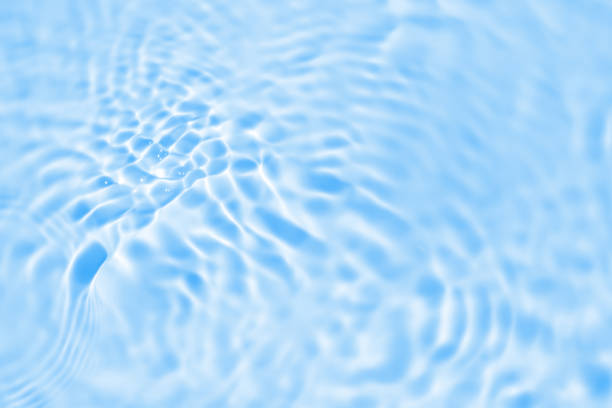 istock Abstract transparent water shadow surface texture natural ripple on blue background 2205944745