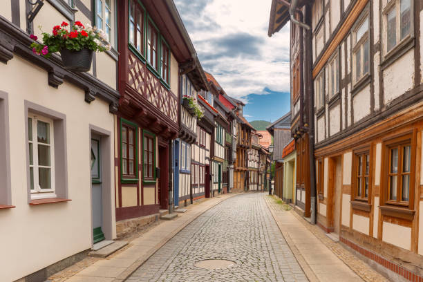 istock Narrow Street with Half-Timbered Houses in Wernigerode, Germany 2205948082