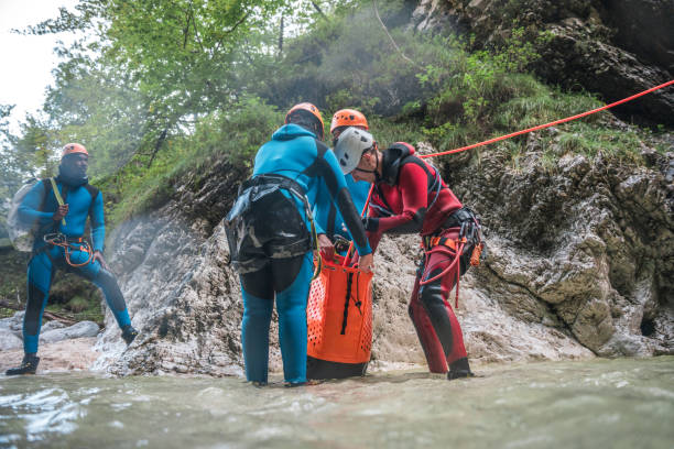istock Gearing Up for Canyoning with Diverse Team 2205953001