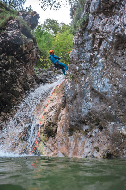 istock Black Male Adventurer in Canyoning Action 2205953006