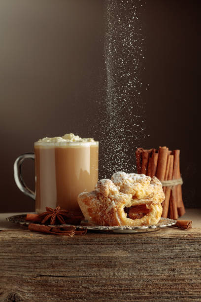 istock Vienna strudel and caffe latte on an old wooden table. 2205954275