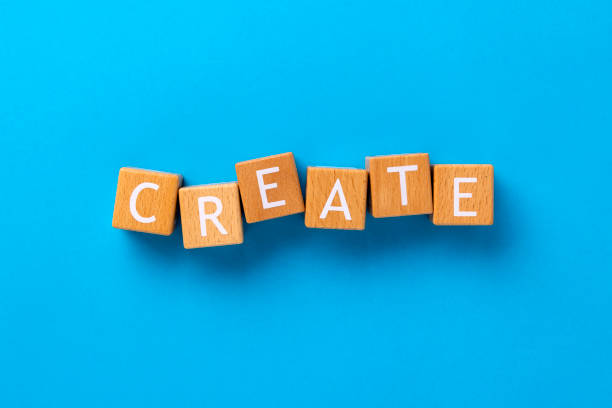 istock Block Letter Word with Create on a Blue Background 2205959393