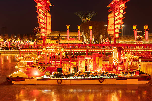 istock Chinese lanterns by the river in winterChinese festive lantern at night 2205962792