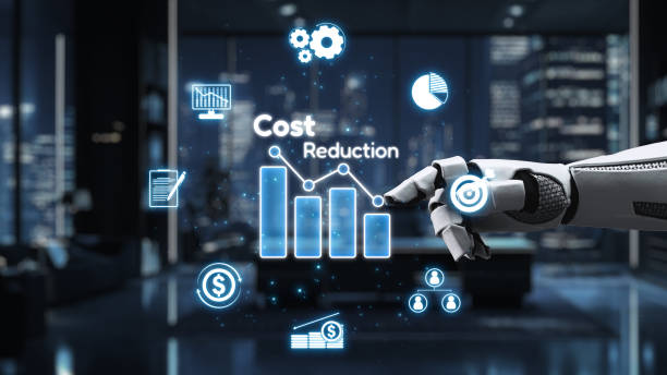 istock Robotic Hand Pointing at Cost Reduction Graph with Financial Icons and Data Visualization in Modern Office Environment at Night. Auvana 2205967452