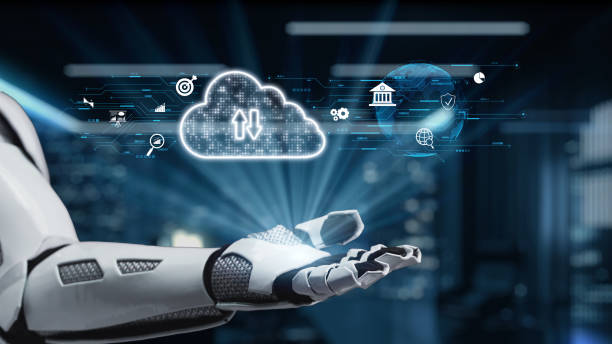 istock Futuristic Robot Hand Reaching Towards Cloud Technology with Data Upload Symbols and Digital Interface in a High-Tech Environment. Auvana 2205967647