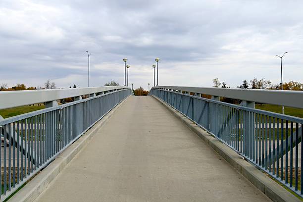 istock pedestrian bridge with metal railings 2205970511
