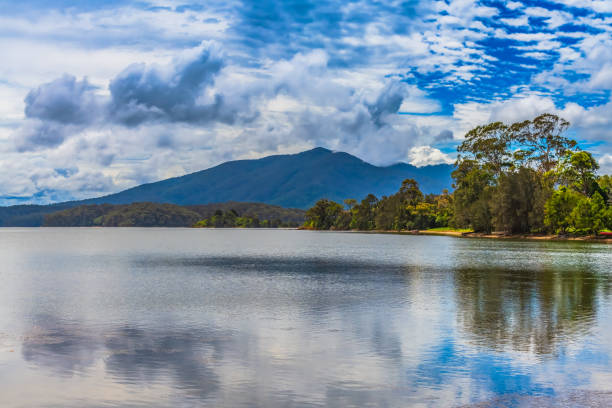 istock After the rain at Wallaga Lake with mountain backdrop 2205971139