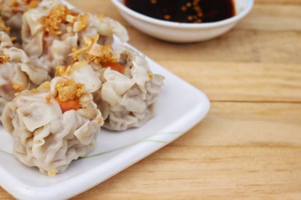 istock Dumpling dim sum and sauce Chinese food 2205972043