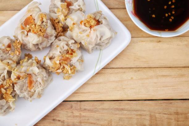 istock Dumpling dim sum and sauce Chinese food 2205972058