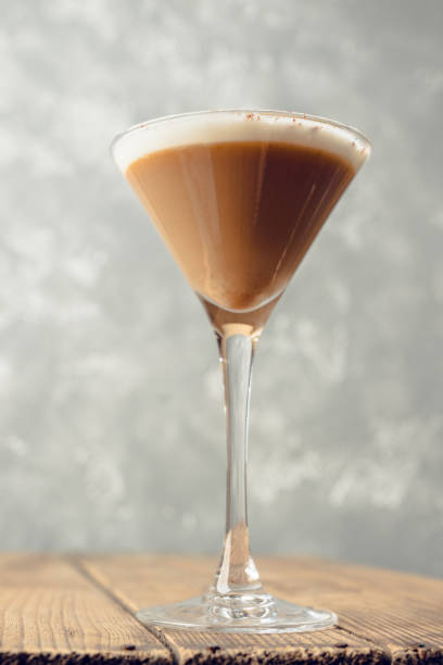istock Coffee liqueur based cocktail in martini glass on the rustic background. Selective focus. 2205972405