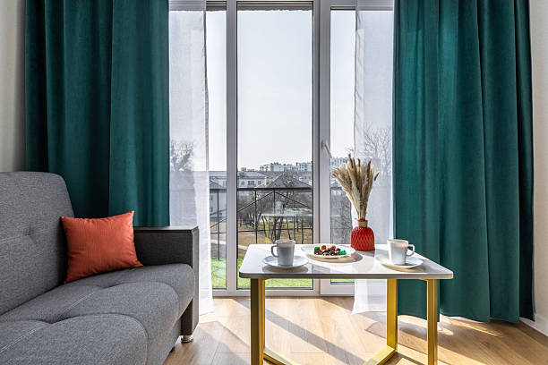 istock Cozy Living Room with Coffee and Sunlight 2205975998