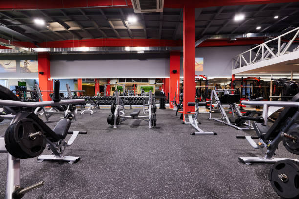 istock Gym without people with large group of exercise machines. 2205984043