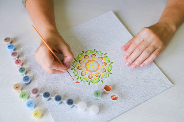 istock Painting Mandala Design with Assorted Colors 2205986675