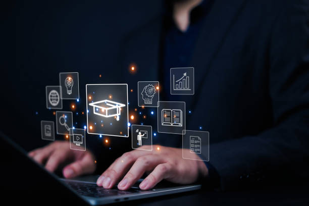 istock E-learning concept, Businessman showing icons in of front him. Learning online educate technology provides easy access, Learning through online greater enhance. training digital online 2205988034