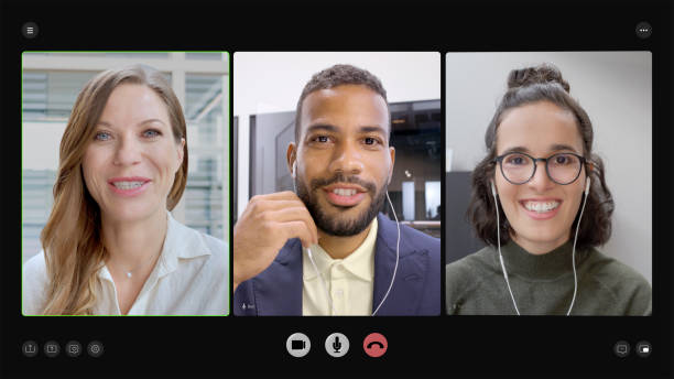 Happy businesspeople chatting on video conference call during office business meeting.