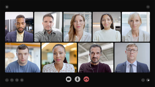 Portrait of co-workers engage in large business meeting over conference call listening and discussing.