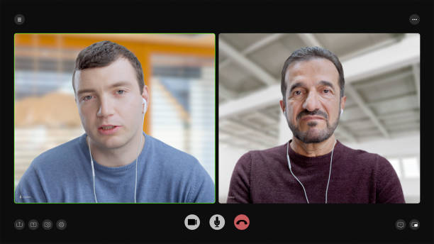 istock Businessmen attending video conference call 2205989875