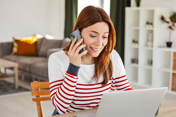 istock oung Professional Juggling Phone and Laptop 2205991097