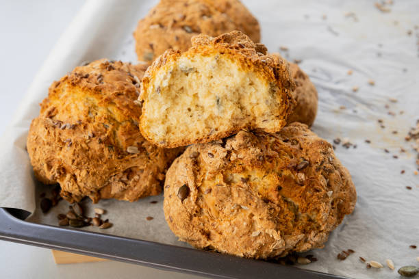 istock freshly baked bread buns with seeds crispy and delicious close-up 2205991755