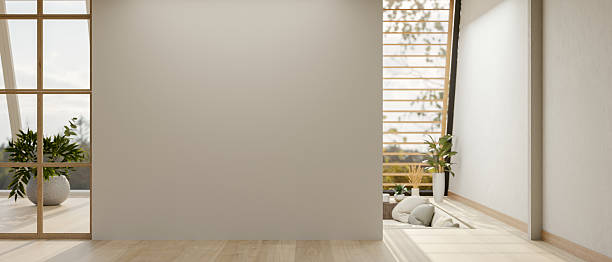 istock A white wall between corridor and conversation pit with a large wall window and nature view outside. 2205997028