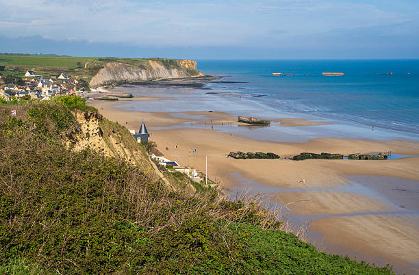 istock Cliffs at Mulberry Harbour at Arromanches and Omaha Beach, Normandy, France 2205997389