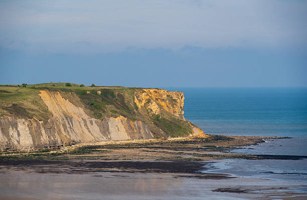istock Cliffs at Mulberry Harbour at Arromanches and Omaha Beach, Normandy, France 2205998686