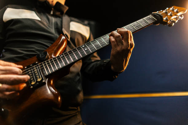istock Electric guitarist playing on live performance 2206000382